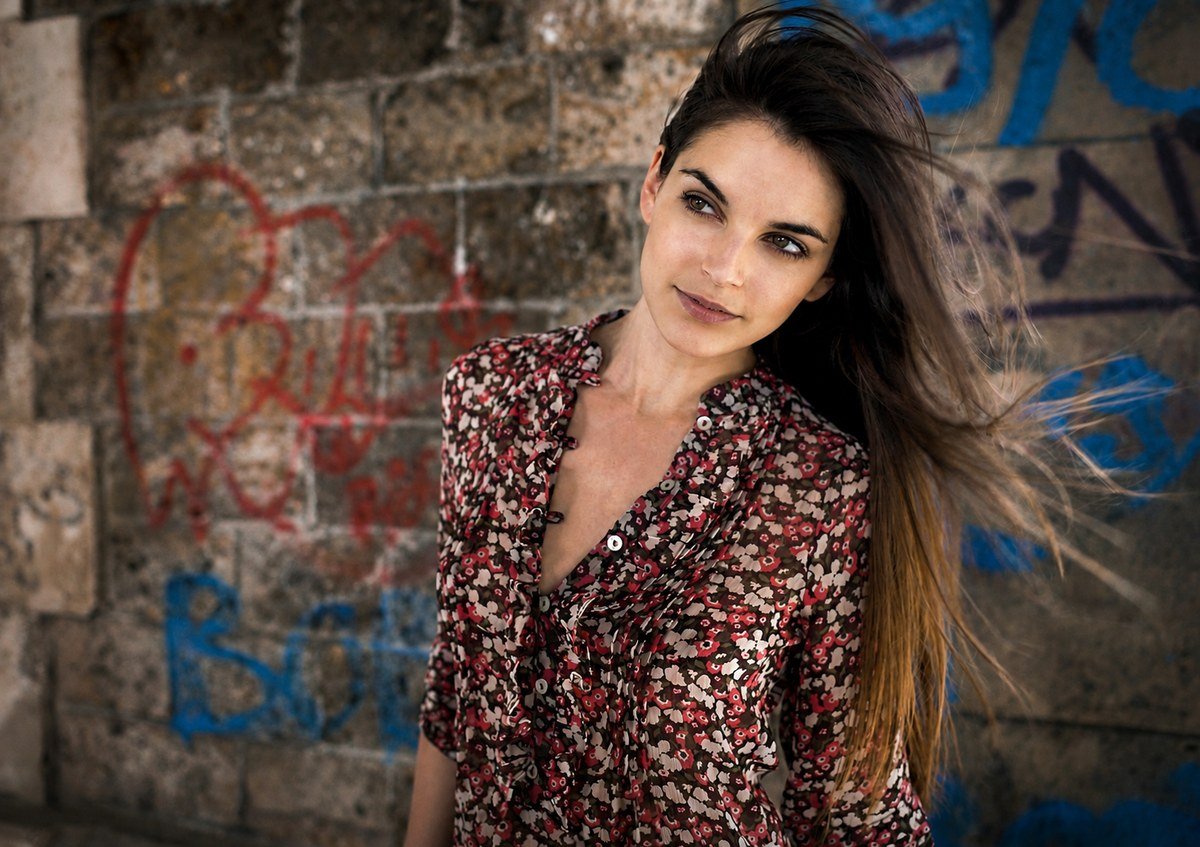 Portrait against a graffiti wall