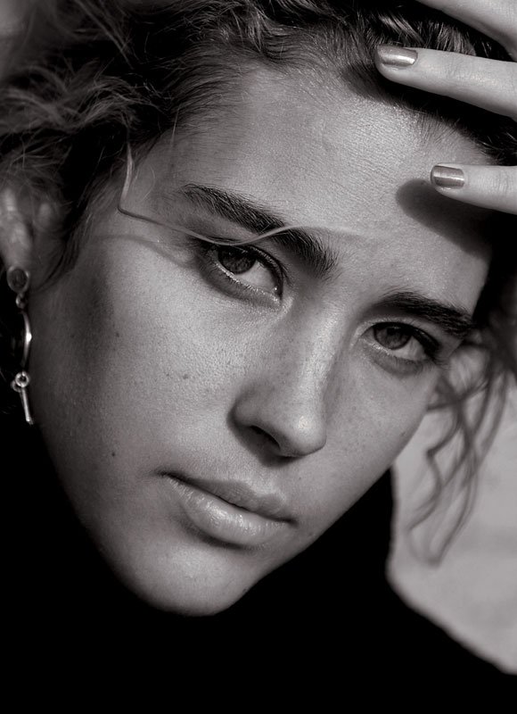 Close-up portrait, hand at forehead